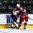 GRAND FORKS, NORTH DAKOTA - APRIL 18: Latvia's Roberts Kalkis #27 and Russia's Ivan Kozlov #17 battle for the puck during preliminary round action at the 2016 IIHF Ice Hockey U18 World Championship. (Photo by Matt Zambonin/HHOF-IIHF Images)

